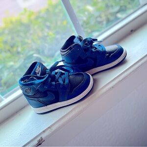 Black and blue Nikes